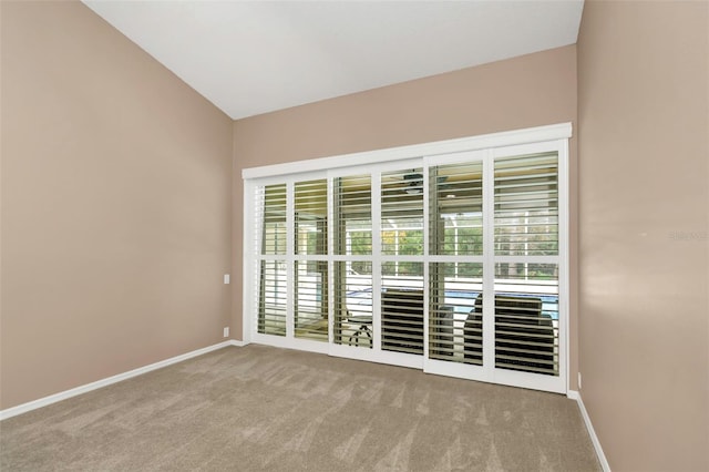 empty room featuring light colored carpet