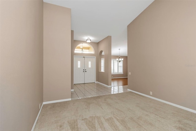 foyer entrance featuring light tile patterned flooring