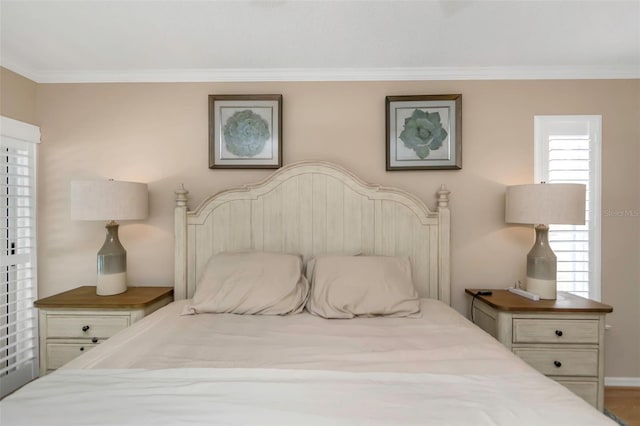 bedroom featuring ornamental molding