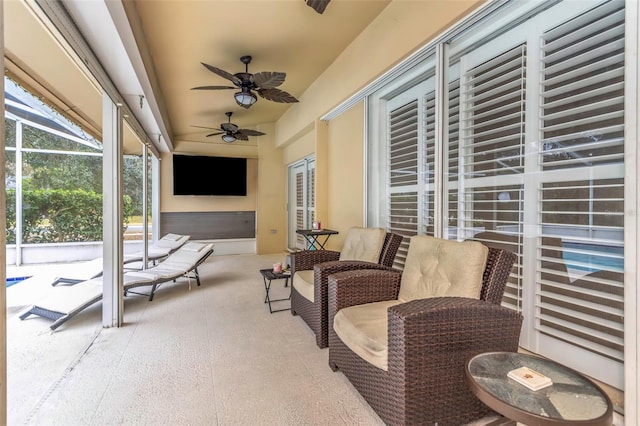 sunroom / solarium with ceiling fan