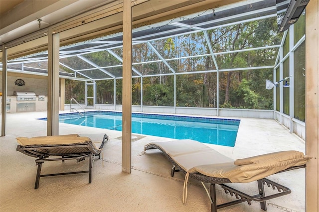 view of pool with grilling area