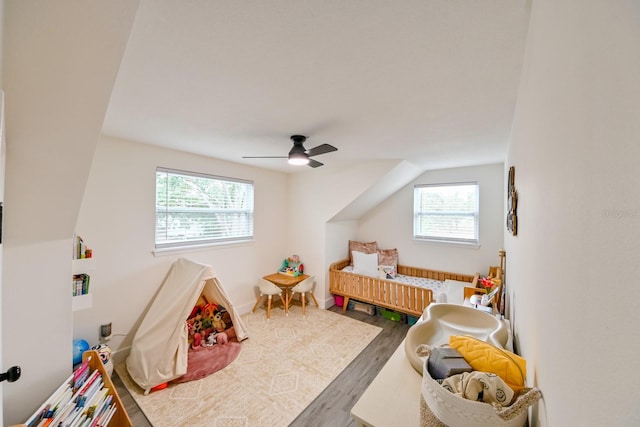 bedroom with ceiling fan and wood finished floors