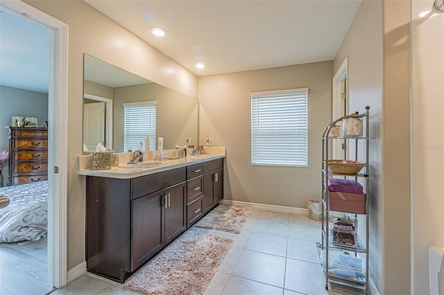 bathroom featuring vanity and tile patterned flooring