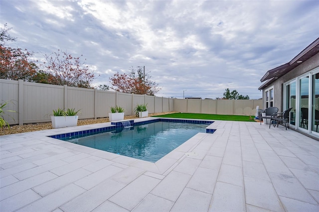 view of pool with a patio