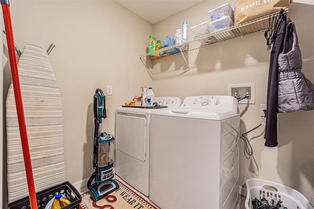 clothes washing area featuring washing machine and dryer