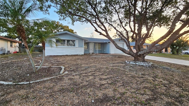 ranch-style home with a garage