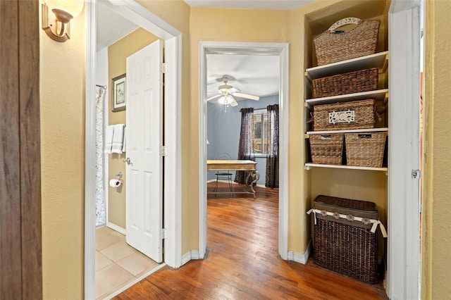 hallway featuring hardwood / wood-style floors