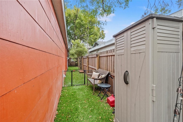 exterior space with a shed