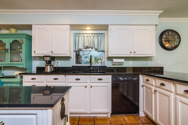 kitchen featuring black dishwasher, white cabinets, dark stone counters, and sink