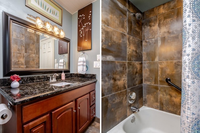 bathroom with vanity and shower / bath combo with shower curtain