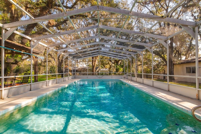 view of pool with a lanai