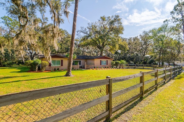 view of front of home with a front yard