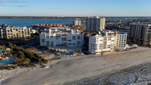 bird's eye view with a beach view and a water view