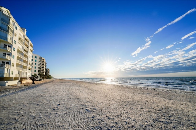 property view of water featuring a beach view