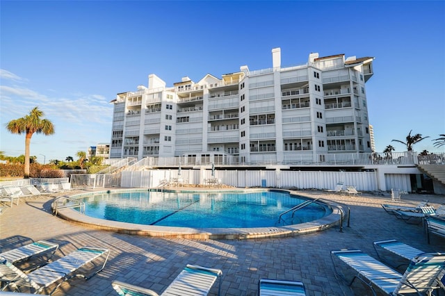 view of pool featuring a patio