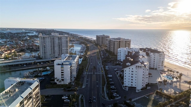 aerial view at dusk with a water view