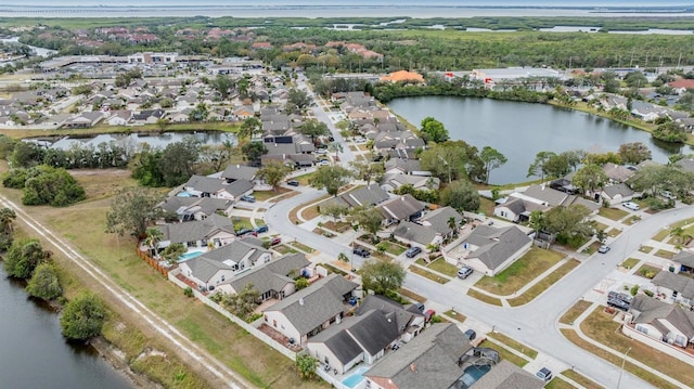 drone / aerial view featuring a water view