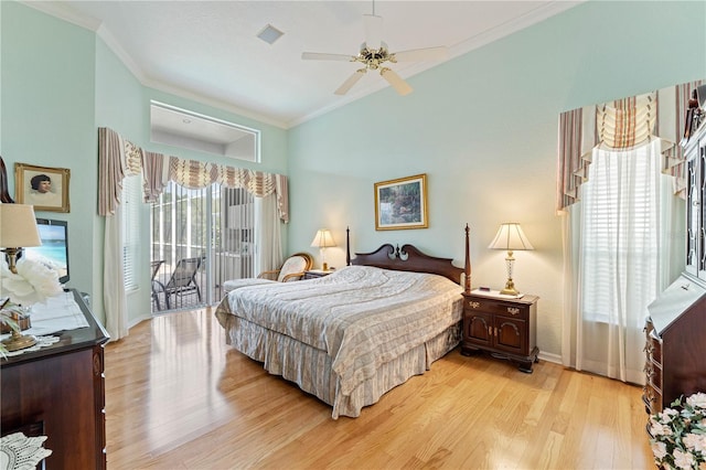 bedroom with ceiling fan, light hardwood / wood-style flooring, multiple windows, and access to outside