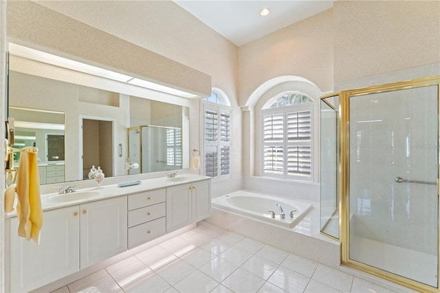 bathroom with vanity, tile patterned flooring, and separate shower and tub