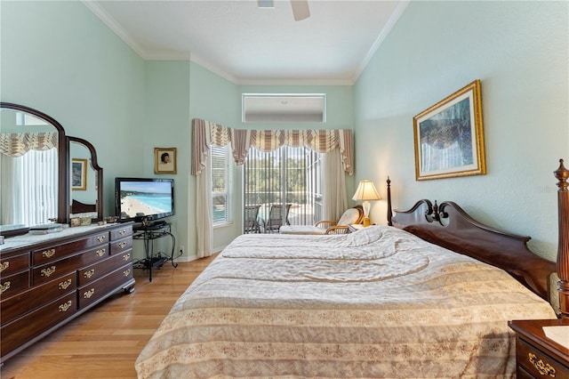 bedroom featuring crown molding, ceiling fan, and light wood-type flooring