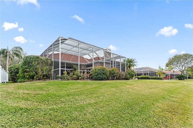 view of yard with a lanai