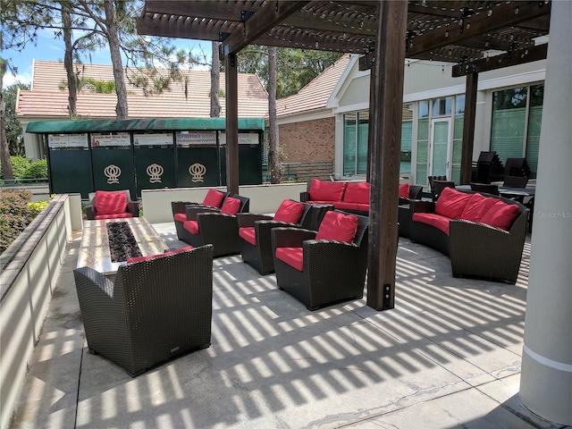 view of patio / terrace featuring outdoor lounge area and a pergola