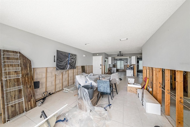 dining area with a textured ceiling