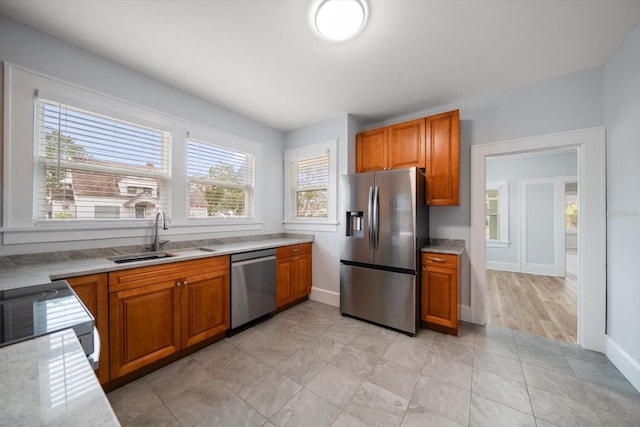 kitchen featuring appliances with stainless steel finishes and sink