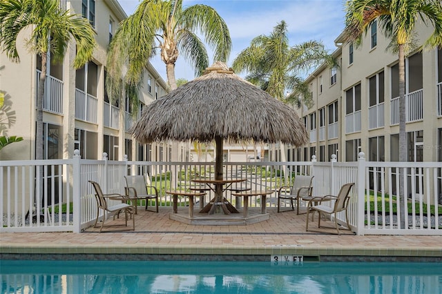 view of swimming pool featuring a gazebo