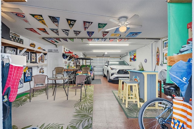 garage featuring ceiling fan