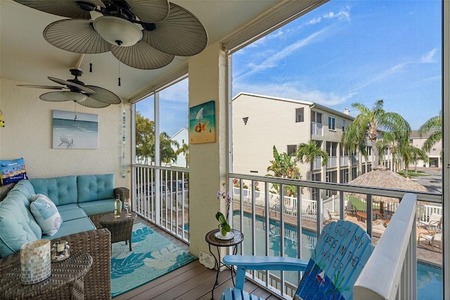 balcony with ceiling fan and outdoor lounge area