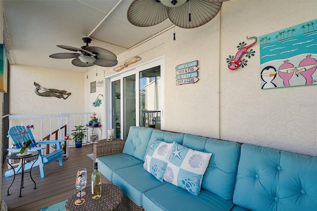 exterior space featuring ceiling fan