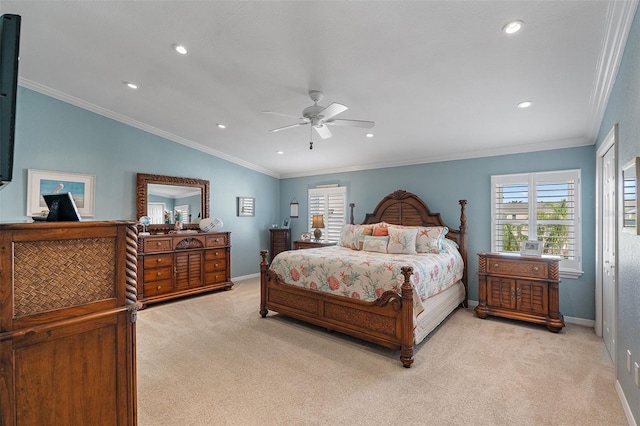 carpeted bedroom with ceiling fan, ornamental molding, and lofted ceiling