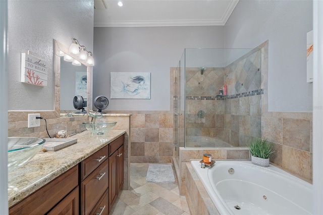 bathroom featuring vanity, crown molding, and separate shower and tub