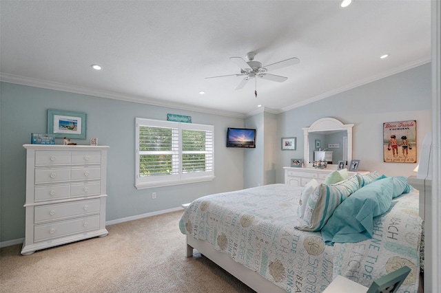 carpeted bedroom featuring ceiling fan and ornamental molding