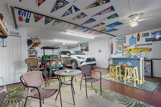 garage with ceiling fan