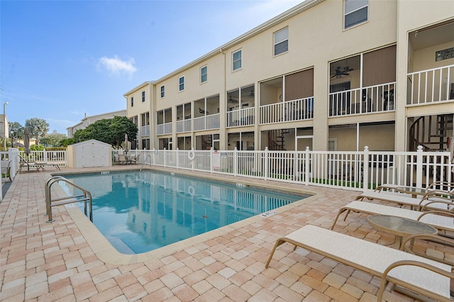 view of swimming pool featuring a patio area