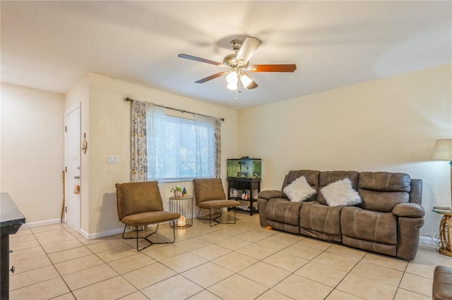 tiled living room featuring ceiling fan