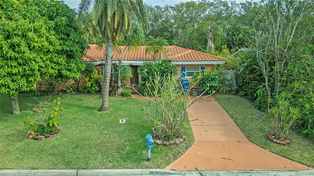 view of front of house with a front lawn