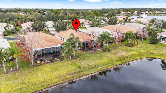 birds eye view of property featuring a water view