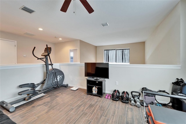 workout area featuring ceiling fan