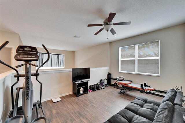 workout area featuring ceiling fan