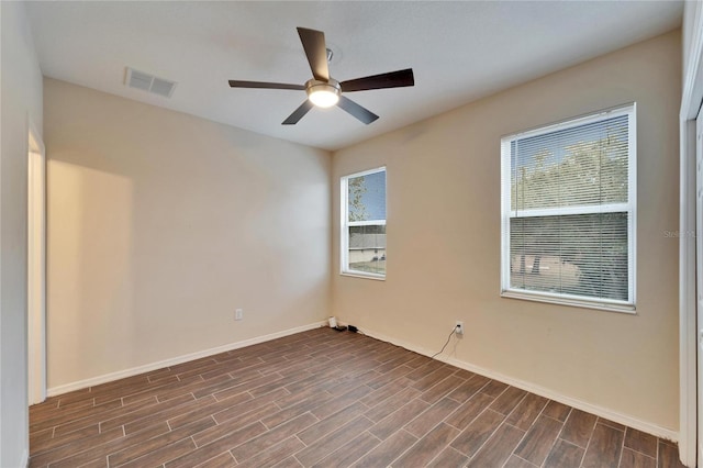 empty room featuring ceiling fan