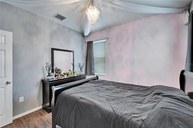 bedroom featuring a chandelier