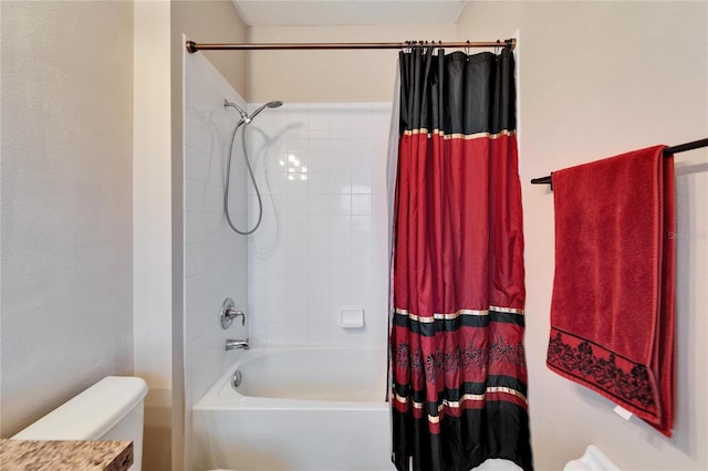 bathroom with toilet and shower / tub combo with curtain