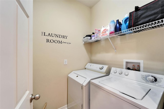 laundry area with washer and clothes dryer