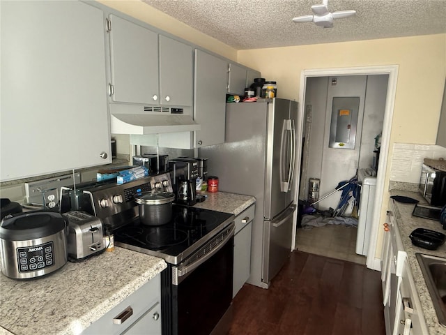 kitchen with a textured ceiling, dark wood-type flooring, electric panel, and stainless steel electric range