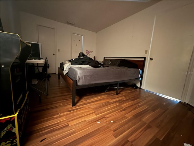 bedroom featuring wood-type flooring