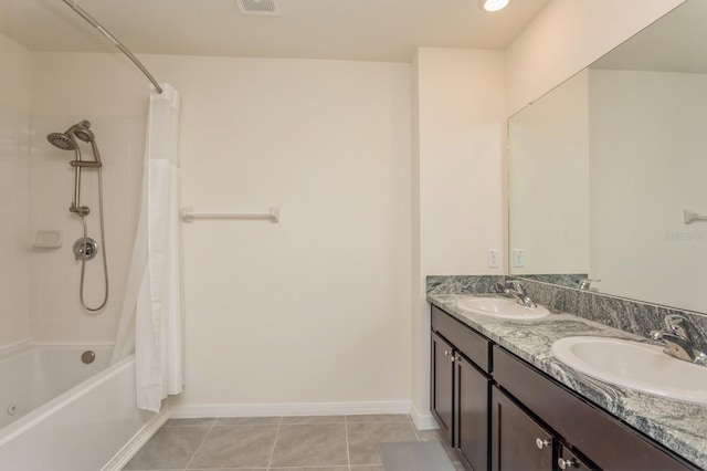 bathroom featuring vanity, tile patterned flooring, and shower / bath combo with shower curtain