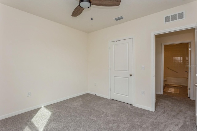 unfurnished bedroom with light carpet and ceiling fan